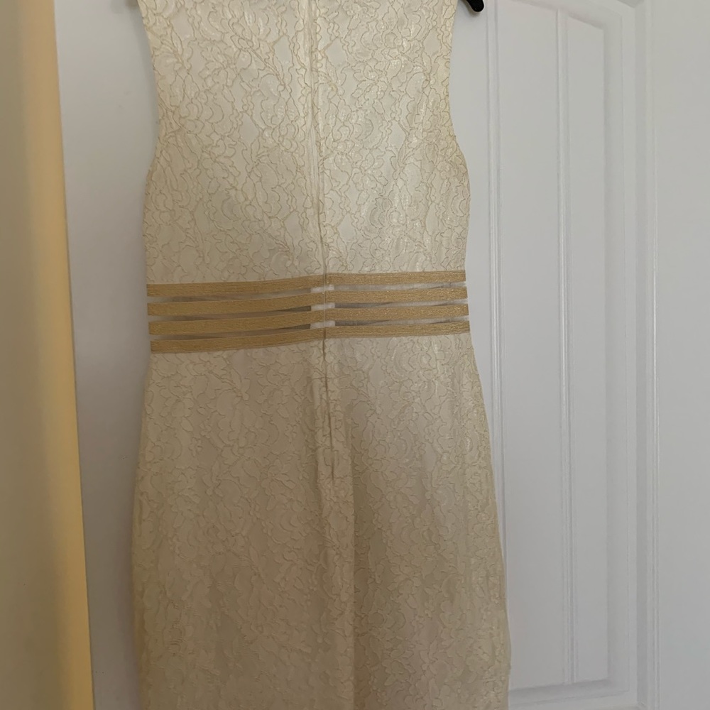A cream & gold dress